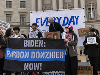 Environmental activists demonstrate outside the Federal Triangle Metro Station in Washington DC, USA, on November 17, 2024. The rally demand...