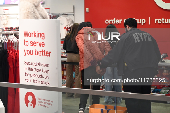 Shoplifting occurs at Target at 255 Greenwich Street in Manhattan, New York, United States, on November 17, 2024. A suspect is seen being ap...