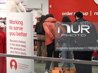 Shoplifting occurs at Target at 255 Greenwich Street in Manhattan, New York, United States, on November 17, 2024. A suspect is seen being ap...