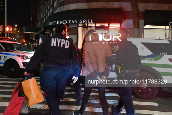 Shoplifting occurs at Target at 255 Greenwich Street in Manhattan, New York, United States, on November 17, 2024. A suspect is seen being ap...