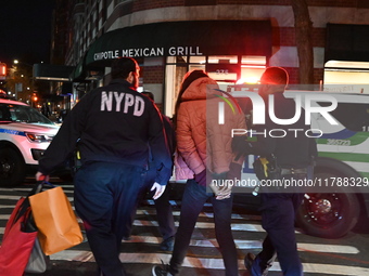 Shoplifting occurs at Target at 255 Greenwich Street in Manhattan, New York, United States, on November 17, 2024. A suspect is seen being ap...