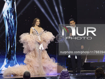 Miss Mexico Maria Fernanda Beltran is interviewed by actor Mario Lopez during her participation in the 73rd Miss Universe Pageant Competitio...