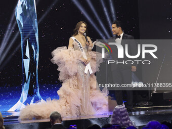 Miss Mexico Maria Fernanda Beltran is interviewed by actor Mario Lopez during her participation in the 73rd Miss Universe Pageant Competitio...