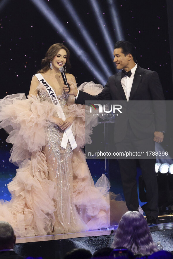 Miss Mexico Maria Fernanda Beltran is interviewed by actor Mario Lopez during her participation in the 73rd Miss Universe Pageant Competitio...