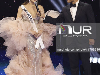 Miss Mexico Maria Fernanda Beltran is interviewed by actor Mario Lopez during her participation in the 73rd Miss Universe Pageant Competitio...