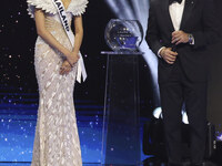 Miss Thailand Opal Suchata Chuangsr is interviewed by actor Mario Lopez during her participation in the 73rd Miss Universe Pageant Competiti...