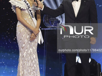 Miss Thailand Opal Suchata Chuangsr is interviewed by actor Mario Lopez during her participation in the 73rd Miss Universe Pageant Competiti...