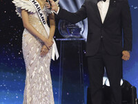 Miss Thailand Opal Suchata Chuangsr is interviewed by actor Mario Lopez during her participation in the 73rd Miss Universe Pageant Competiti...