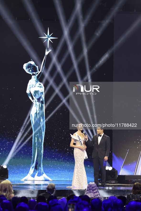 Miss Thailand Opal Suchata Chuangsr is interviewed by actor Mario Lopez during her participation in the 73rd Miss Universe Pageant Competiti...