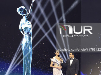 Miss Thailand Opal Suchata Chuangsr is interviewed by actor Mario Lopez during her participation in the 73rd Miss Universe Pageant Competiti...