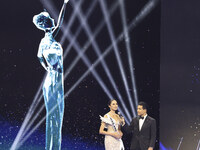 Miss Thailand Opal Suchata Chuangsr is interviewed by actor Mario Lopez during her participation in the 73rd Miss Universe Pageant Competiti...