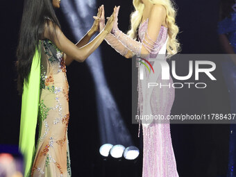 Miss Nigeria Chidimma Adetshina and Miss Denmark Victoria Kjaer Theilvi participate in The 73rd Miss Universe Pageant Competition show at Me...