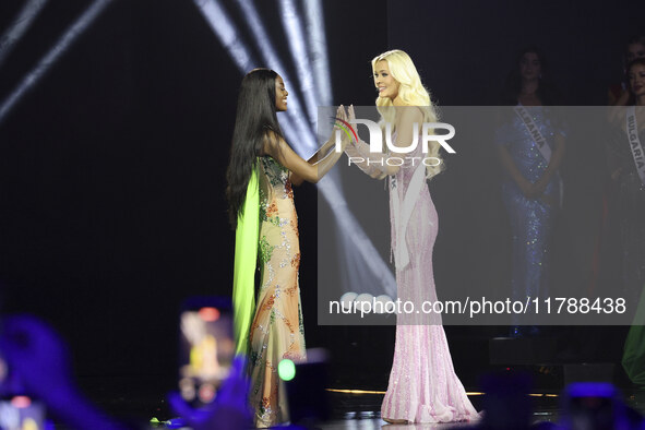 Miss Nigeria Chidimma Adetshina and Miss Denmark Victoria Kjaer Theilvi participate in The 73rd Miss Universe Pageant Competition show at Me...