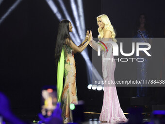 Miss Nigeria Chidimma Adetshina and Miss Denmark Victoria Kjaer Theilvi participate in The 73rd Miss Universe Pageant Competition show at Me...