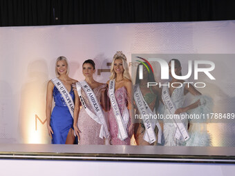 (L-R) Miss Finland Matilda Wirtavuori, Miss Peru Tatiana Calmell, Miss Denmark Victoria Kjaer, and Miss Nigeria Chidimma Adetshinar attend a...