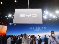 Visitors visit BYD's stand at the Guangzhou Auto Show 2024 in Guangzhou, Guangdong, China, on November 15, 2024. China's new energy vehicle...