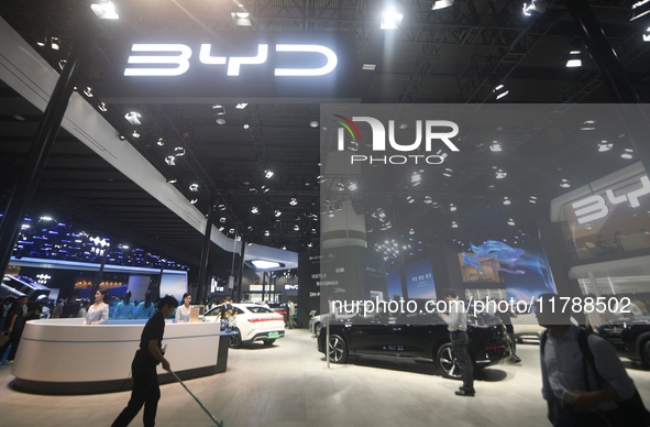 Visitors visit BYD's stand at the Guangzhou Auto Show 2024 in Guangzhou, Guangdong, China, on November 15, 2024. China's new energy vehicle...