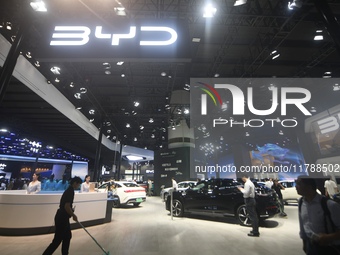 Visitors visit BYD's stand at the Guangzhou Auto Show 2024 in Guangzhou, Guangdong, China, on November 15, 2024. China's new energy vehicle...