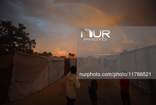 Internally displaced Palestinian children, who flee with their families from the Israeli military bombing and incursion in the northern Gaza...