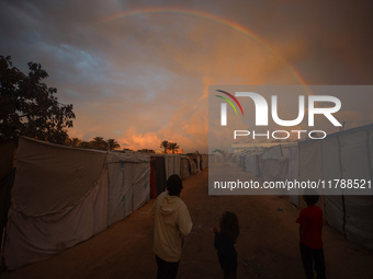 Internally displaced Palestinian children, who flee with their families from the Israeli military bombing and incursion in the northern Gaza...