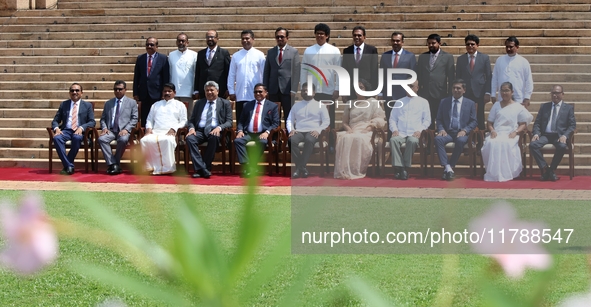 Sri Lankan President Anura Kumara Dissanayake and Prime Minister Harini Amarasuriya pose for a photograph with newly appointed cabinet minis...