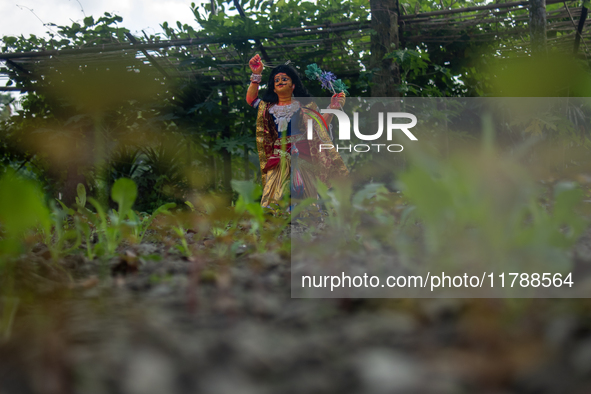 A clay idol of Kartik is on a vegetable farming field in Nandail, Mymensingh, Bangladesh, on November 18, 2024. In regional folklore, Kartik...