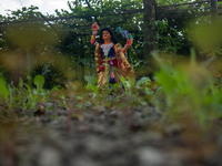 A clay idol of Kartik is on a vegetable farming field in Nandail, Mymensingh, Bangladesh, on November 18, 2024. In regional folklore, Kartik...