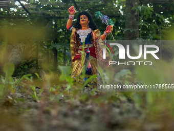 A clay idol of Kartik is on a vegetable farming field in Nandail, Mymensingh, Bangladesh, on November 18, 2024. In regional folklore, Kartik...