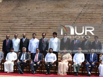 Sri Lankan President Anura Kumara Dissanayake and Prime Minister Harini Amarasuriya pose for a photograph with newly appointed cabinet minis...