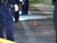 The NYPD Evidence Collection Team responds to the scene to photograph, mark, and collect evidence after a 28-year-old man is shot in the leg...