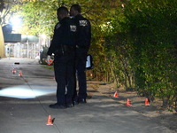 The NYPD Evidence Collection Team responds to the scene to photograph, mark, and collect evidence after a 28-year-old man is shot in the leg...