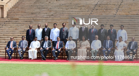 Sri Lankan President Anura Kumara Dissanayake and Prime Minister Harini Amarasuriya pose for a photograph with newly appointed cabinet minis...