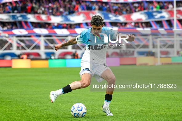 Gaston Martirena of Racing Club kicks the ball during a Liga Profesional 2024 match between San Lorenzo and Racing Club at Stadium Pedro Bid...