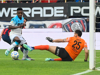 Goalkeeper Gaston Gomez of San Lorenzo competes for the ball against Jonathan Carbonero of Racing Club during a Liga Profesional 2024 match...