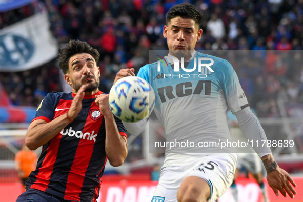 Cerutti of San Lorenzo competes for the ball against Santiago Quiroz of Racing Club during a Liga Profesional 2024 match between San Lorenzo...