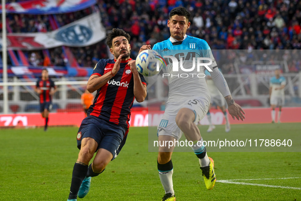 Cerutti of San Lorenzo competes for the ball against Santiago Quiroz of Racing Club during a Liga Profesional 2024 match between San Lorenzo...