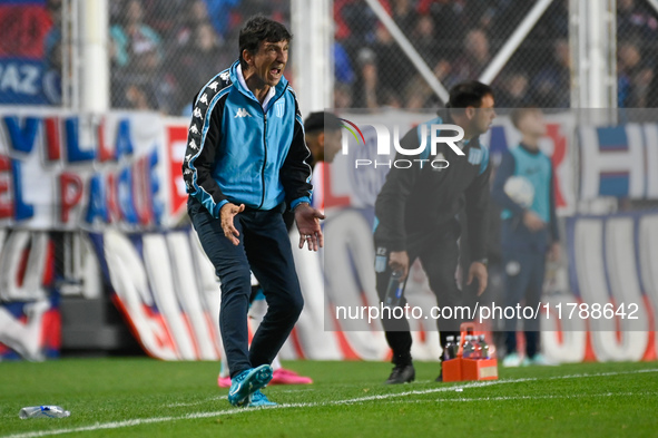 Gustavo Costas, coach of Racing Club, gives instructions to his team players during a Liga Profesional 2024 match between San Lorenzo and Ra...