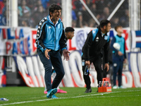 Gustavo Costas, coach of Racing Club, gives instructions to his team players during a Liga Profesional 2024 match between San Lorenzo and Ra...