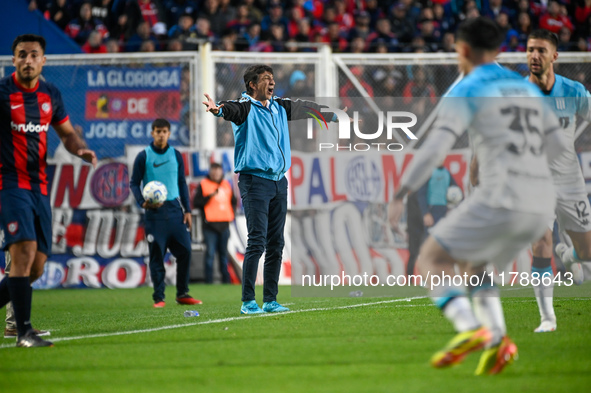 Gustavo Costas, coach of Racing Club, gives instructions to his team players during a Liga Profesional 2024 match between San Lorenzo and Ra...