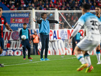 Gustavo Costas, coach of Racing Club, gives instructions to his team players during a Liga Profesional 2024 match between San Lorenzo and Ra...