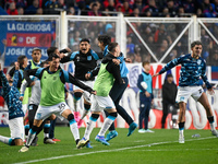 Gustavo Costas, coach of Racing Club, celebrates with his teammates after his team scores a goal during a Liga Profesional 2024 match betwee...