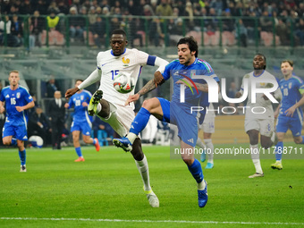 Sandro Tonali (Italy) and Ibrahima Konate (France) participate in the UEFA Nations League, League A, Group A2 football match between Italy a...