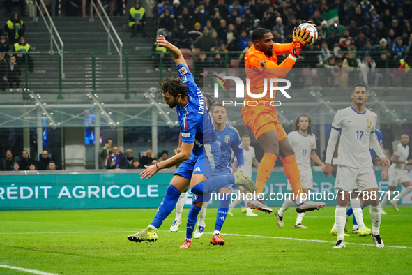 Mike Maignan (France) participates in the UEFA Nations League, League A, Group A2 football match between Italy and France in Milan, Italy, o...