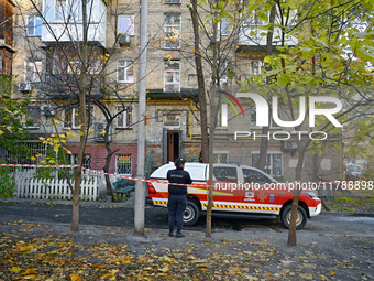 The territory around a five-storey apartment building in the Pecherskyi district, hit by a piece of a Russian missile, is sealed in Kyiv, Uk...