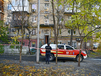 The territory around a five-storey apartment building in the Pecherskyi district, hit by a piece of a Russian missile, is sealed in Kyiv, Uk...