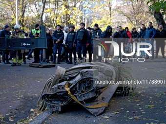 A fragment of a Russian missile is on the ground after being removed by State Emergency Service workers from a five-storey apartment buildin...