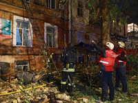 A response effort to a fire in a three-story residential building caused by a Russian missile and drone attack is underway in central Odesa,...