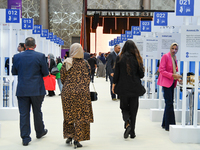 People arrive at the opening ceremony of the ROWAD Entrepreneurship Conference and the Arab SMEs Summit 2024 in Doha, Qatar, on November 18,...