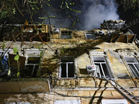 A three-storey residential building in downtown Odesa, Ukraine, is damaged by a Russian missile and drone attack on November 15, 2024. (