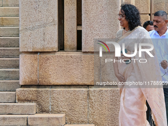 Sri Lankan Prime Minister Harini Amarasuriya walks to take a photograph with the newly appointed cabinet ministers at the president's office...